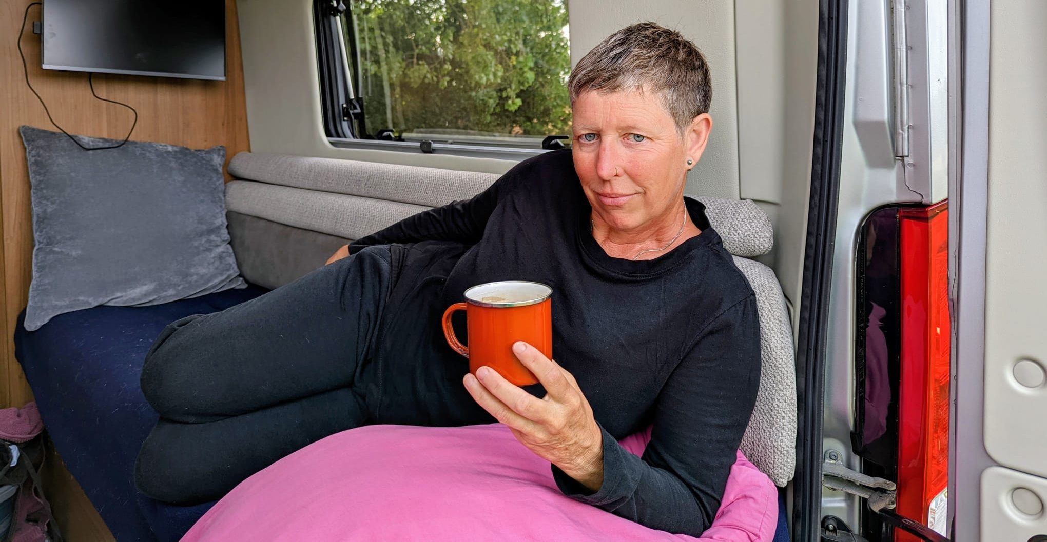Lucy Trend relaxing in her camper van